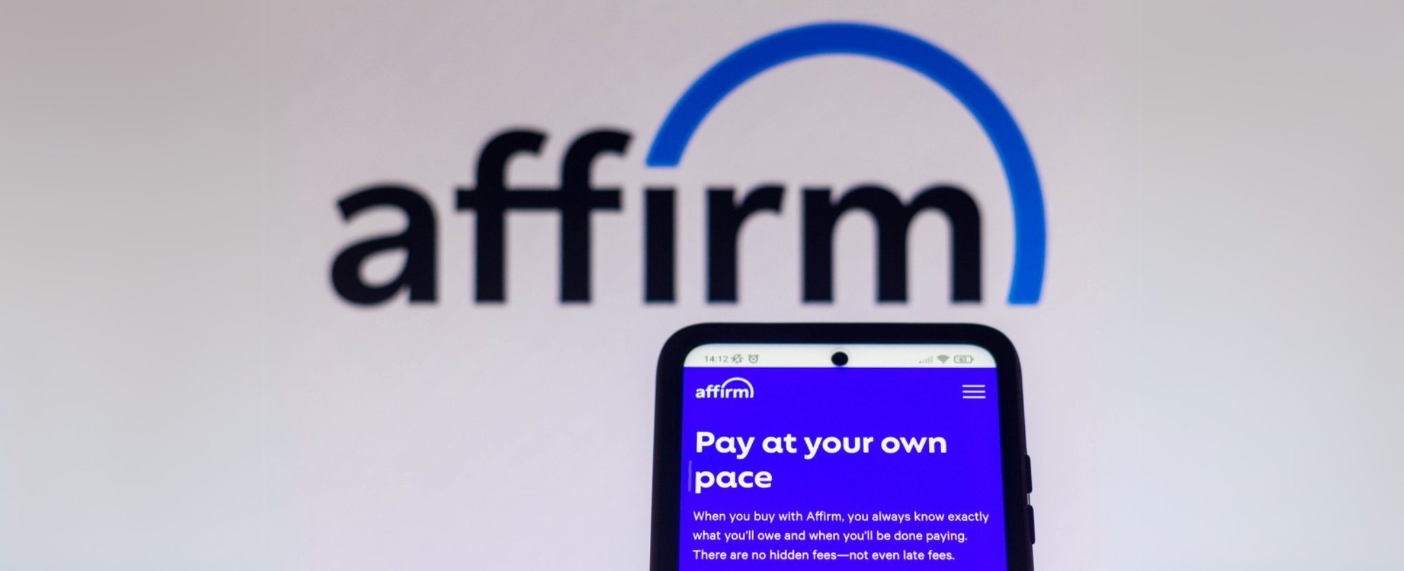 October 13, 2021, Brazil. In this photo illustration the Affirm webpage seen displayed on a smartphone and logo in the background - Stock Editorial Photography