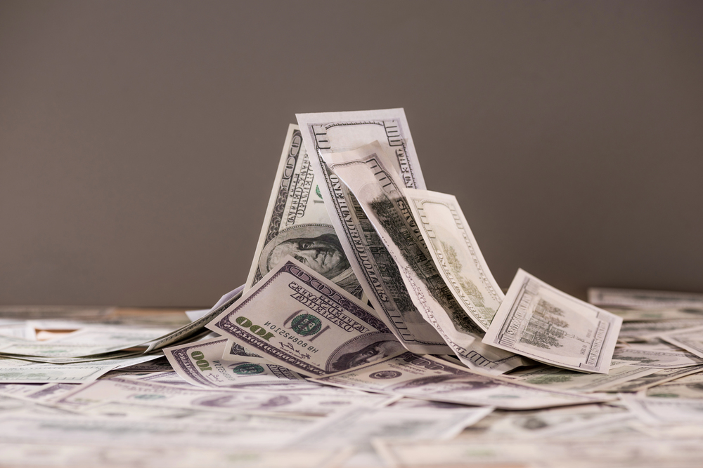 Heap of banknotes of us dollars — Photo