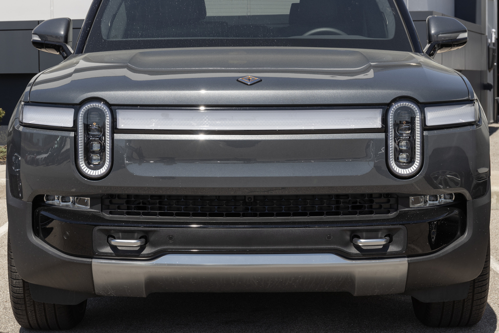 Indianapolis - Circa April 2023: Rivian R1S EV Electric Vehicle display at a dealership. Rivian offers the R1S in Adventure and Launch models.