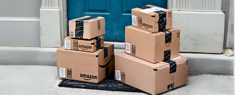 Photo of a bunch of Amazon boxes stacked at a front door