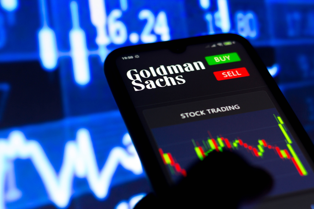 Photo of the Goldman Sachs Group logo seen on a smartphone screen with stock trading