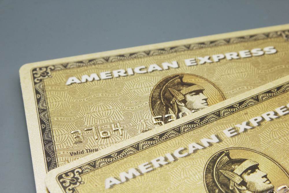 Buenos Aires/Argentine - April 09 2020: Close-up of American Express cards placed on a dark background - Stock Editorial Photography