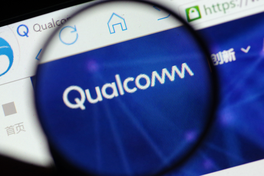 A Chinese netizen browses the website of Qualcomm in Ji'nan city, east China's Shandong province, 24 May 2018 - Stock Editorial Photography