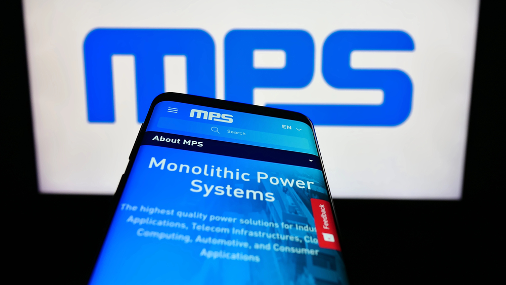 Stuttgart, Germany - 08-05-2023: Mobile phone with website of US company Monolithic Power Systems Inc. (MPS) on screen in front of logo. Focus on top-left of phone display. - Stock Editorial Photography