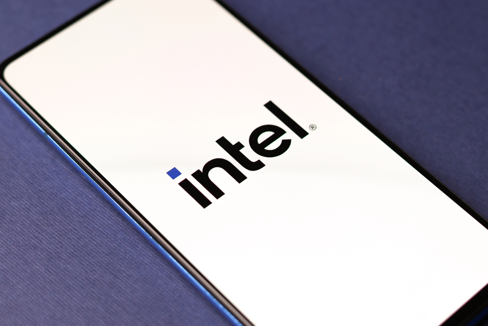 Assam, india - December 20, 2020 : Intel logo on phone screen stock image. - Stock Editorial Photography