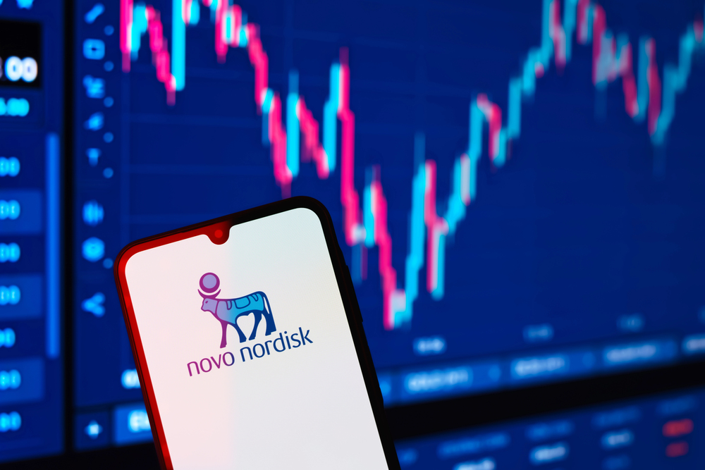 Prague, Czechia: Modern smartphone with novo nordisk logo with chart on background — Stock Editorial Photography