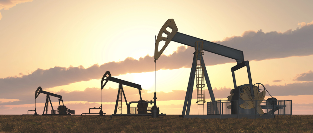 Oil pumps at sunset — Photo