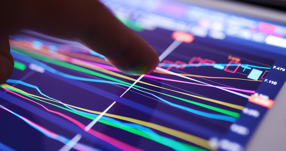 Stock market graph and information showing on digital tablet — Photo