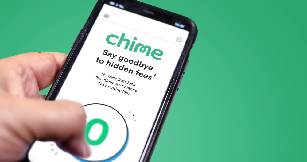 San Francisco, Ca, USA, December 2021: A hand holding a phone with the Chime app on the screen. Chime is an American financial technology company which provides fee-free mobile banking services