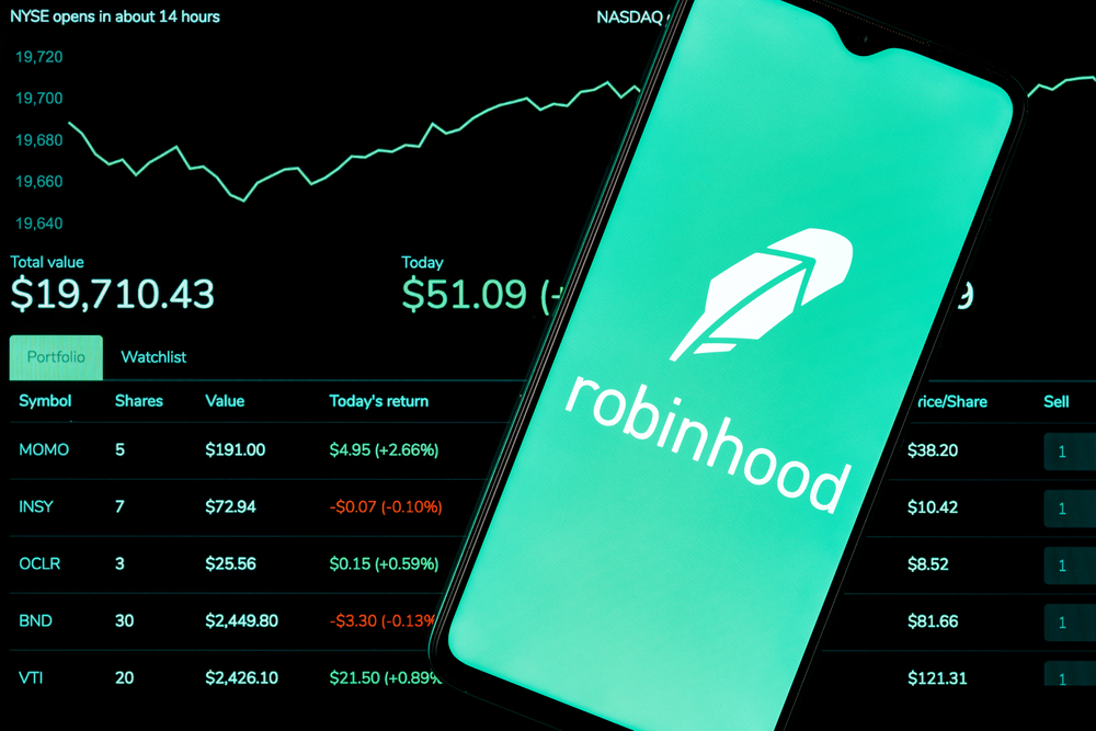 Kazan, Russia - Oct 19, 2021: Robinhood Markets is an American broker-dealer company. A smartphone with the Robinhood logo on the background of the live trading webpage. Robinhood dashboard. - Stock Editorial Photography