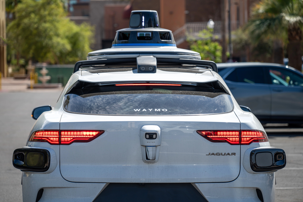 Phoenix, Arizona, USA - 3.23.2024: Behind a Waymo self-driving car stopped at an intersection. High quality photo — Stock Editorial Photography