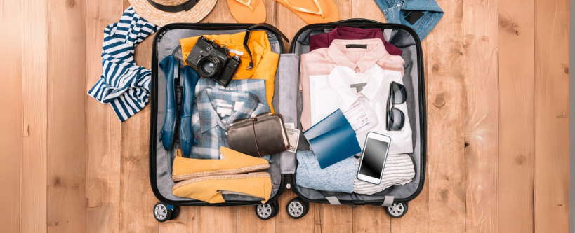 Traveler's accessories in open luggage