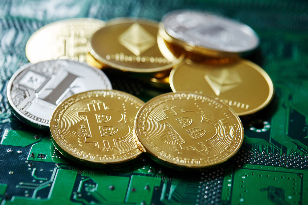 Stack of cryptocurrencies in a circle on motherboard. Cryptocurrency concept, close-up, selective focus — Stock Editorial Photography