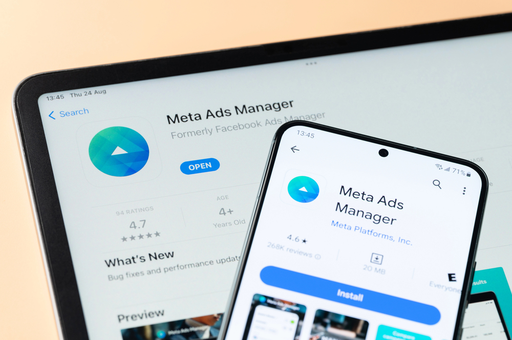 Meta Ads Manager app on Ipad and google store on smartphone and ipad screen close up view