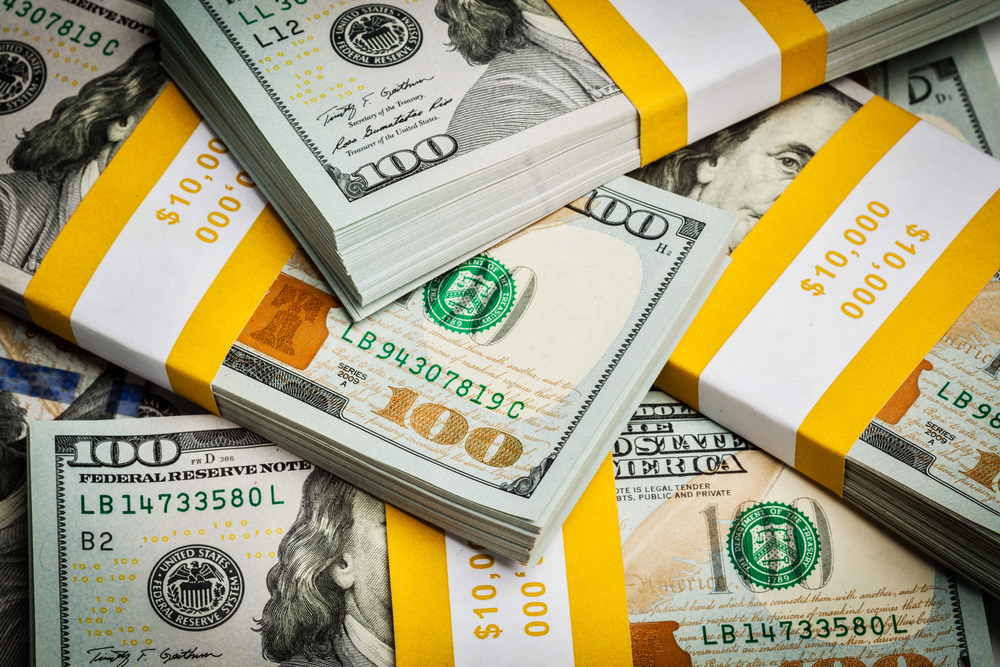Background of new 100 US dollars banknotes bills - stock image