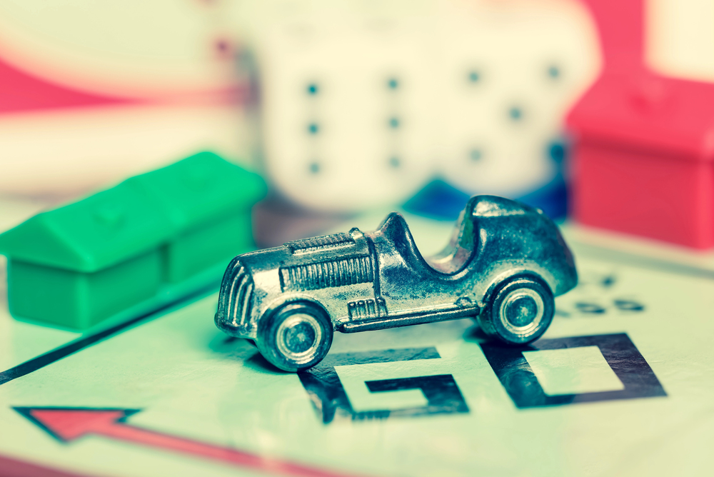 monopoly Car token and dices — Stock Editorial Photography