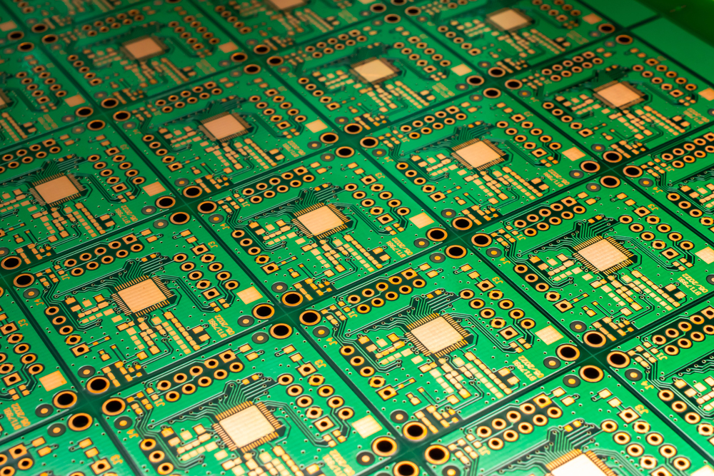 A printed circuit board in blue - stock image