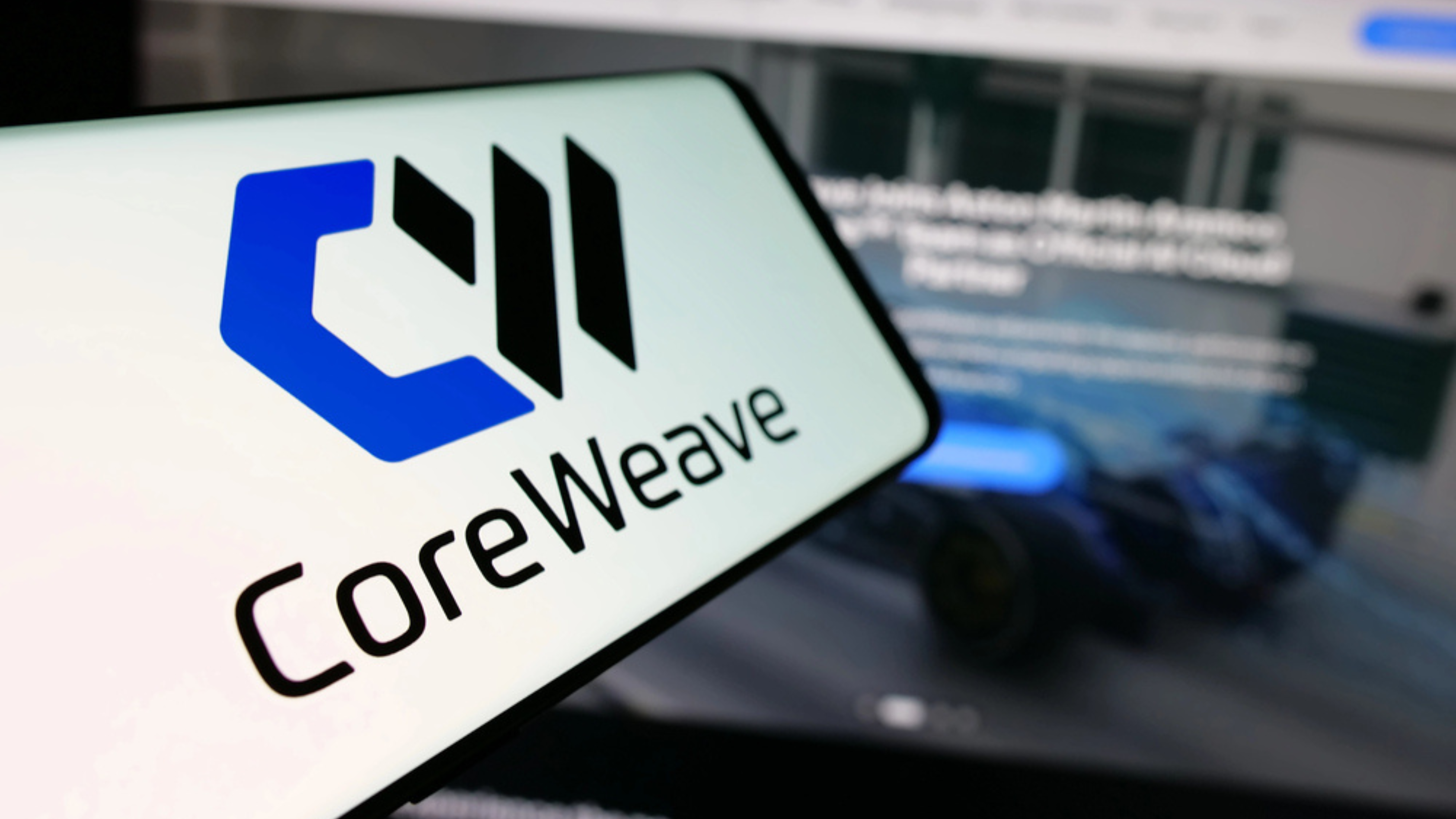 Stuttgart, Germany - 06-07-2025: Smartphone with logo of US AI cloud computing company CoreWeave Inc. on screen in front of website. Focus on center-left of phone display. — Stock Editorial Photography