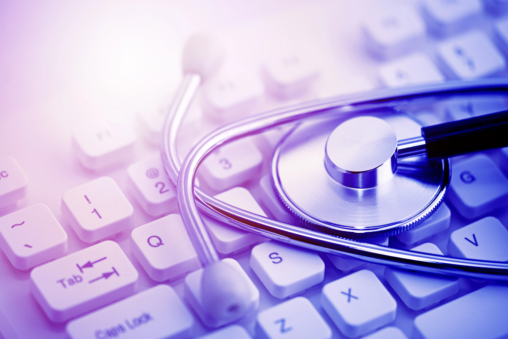 Stethoscope on computer keyboard