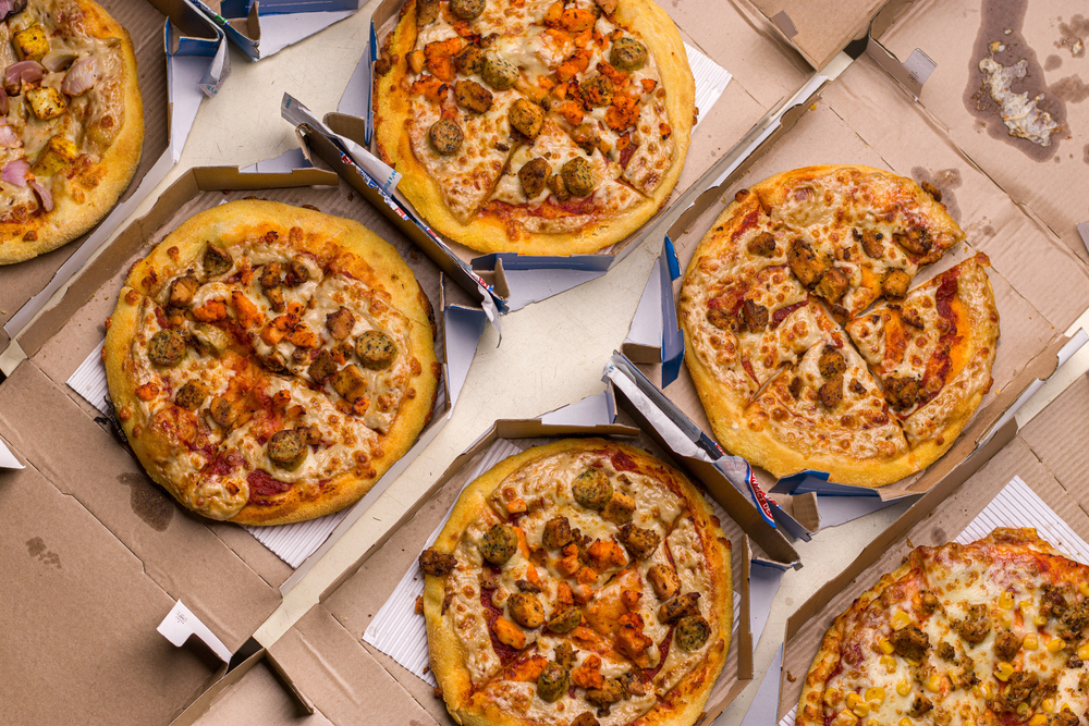 West Bangal, India - August 21, 2021 : Dominos pizza on box stock image.