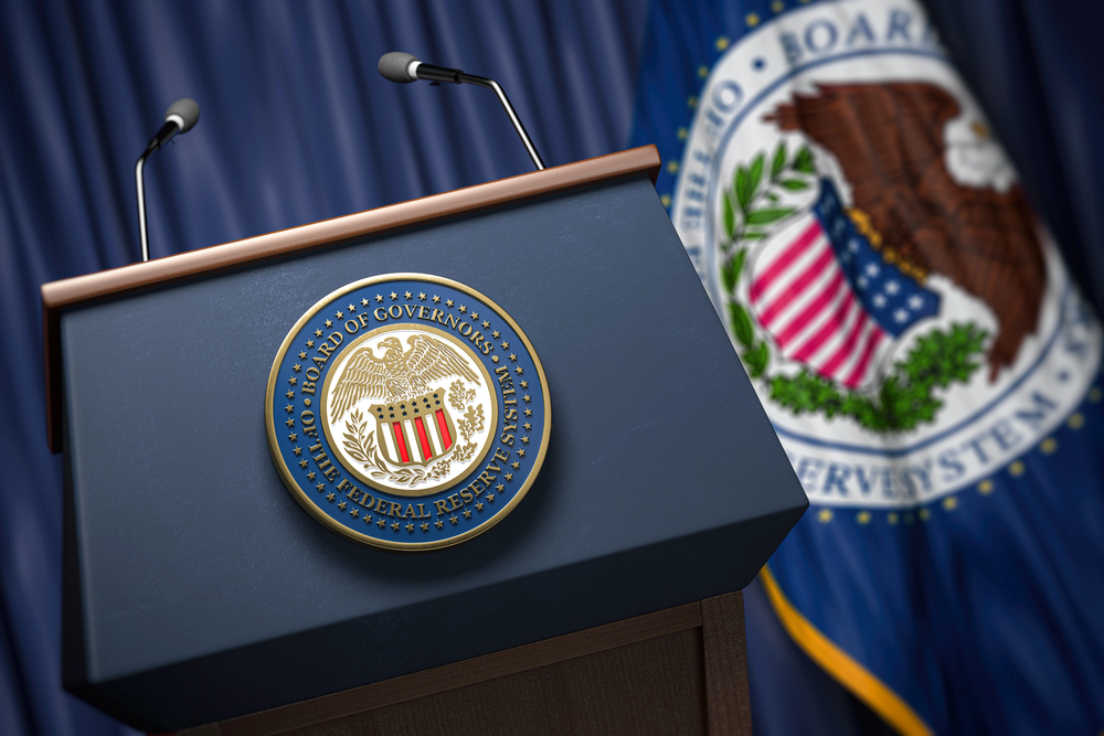 Federal Reserve System Fed of USA chairman press conference concept. Tribune with symbol and flag of Fedreal Reserve. 3d illustration
