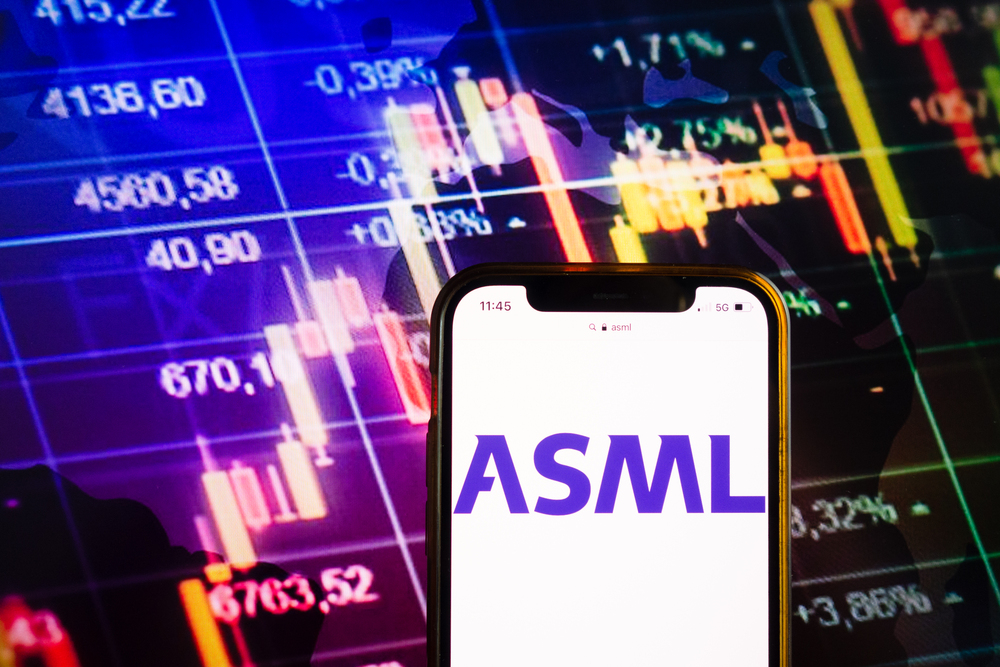 Smartphone displaying logo of ASML Holding NV on stock exchange diagram background