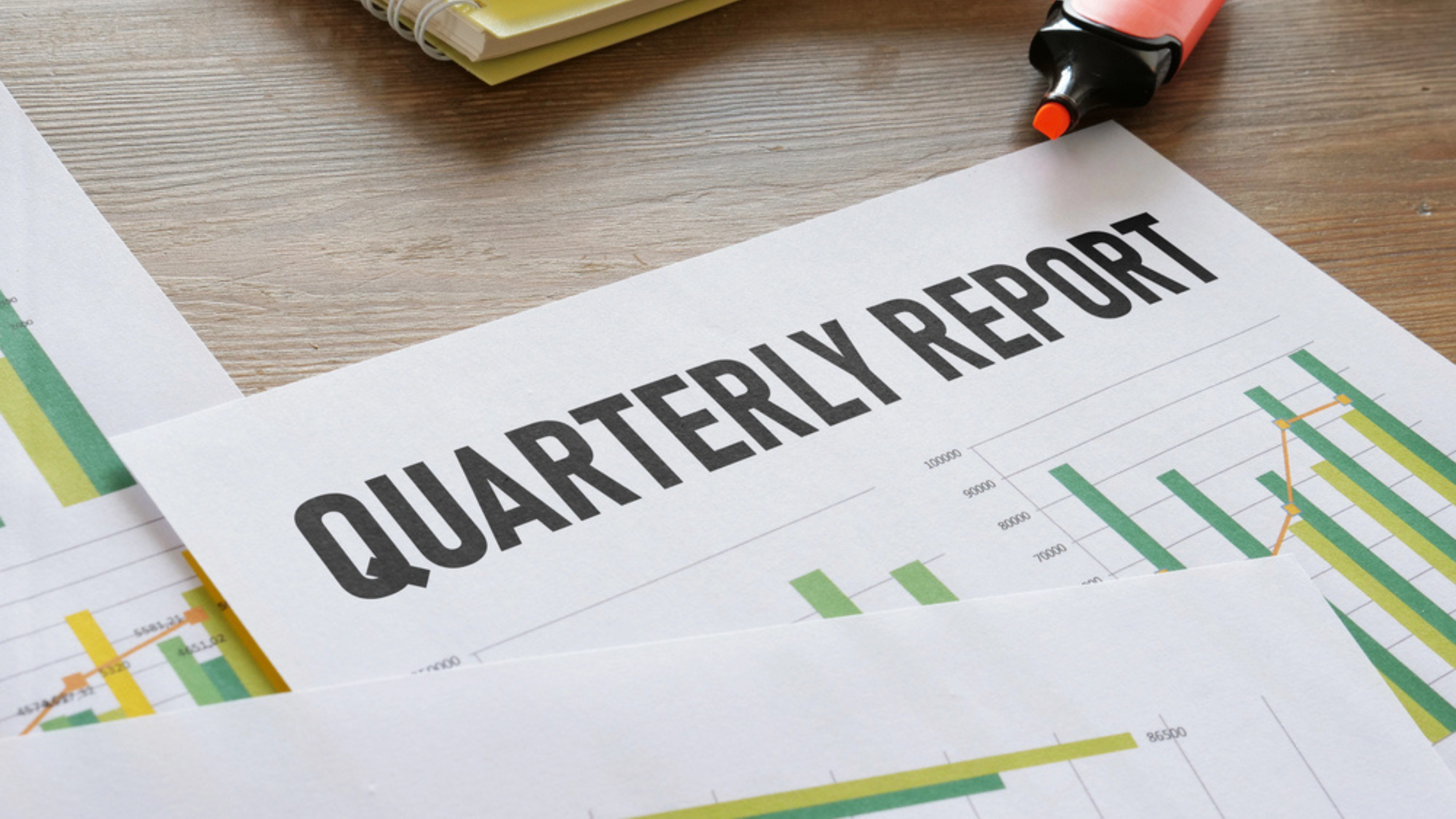 Quarterly report is shown using a text — Photo