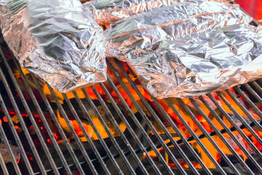 aluminum foil on the grill 