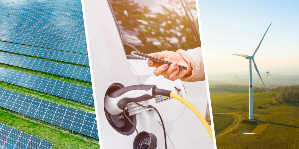 Renewable energy concept with wind mills, solar panel and electric car EV
