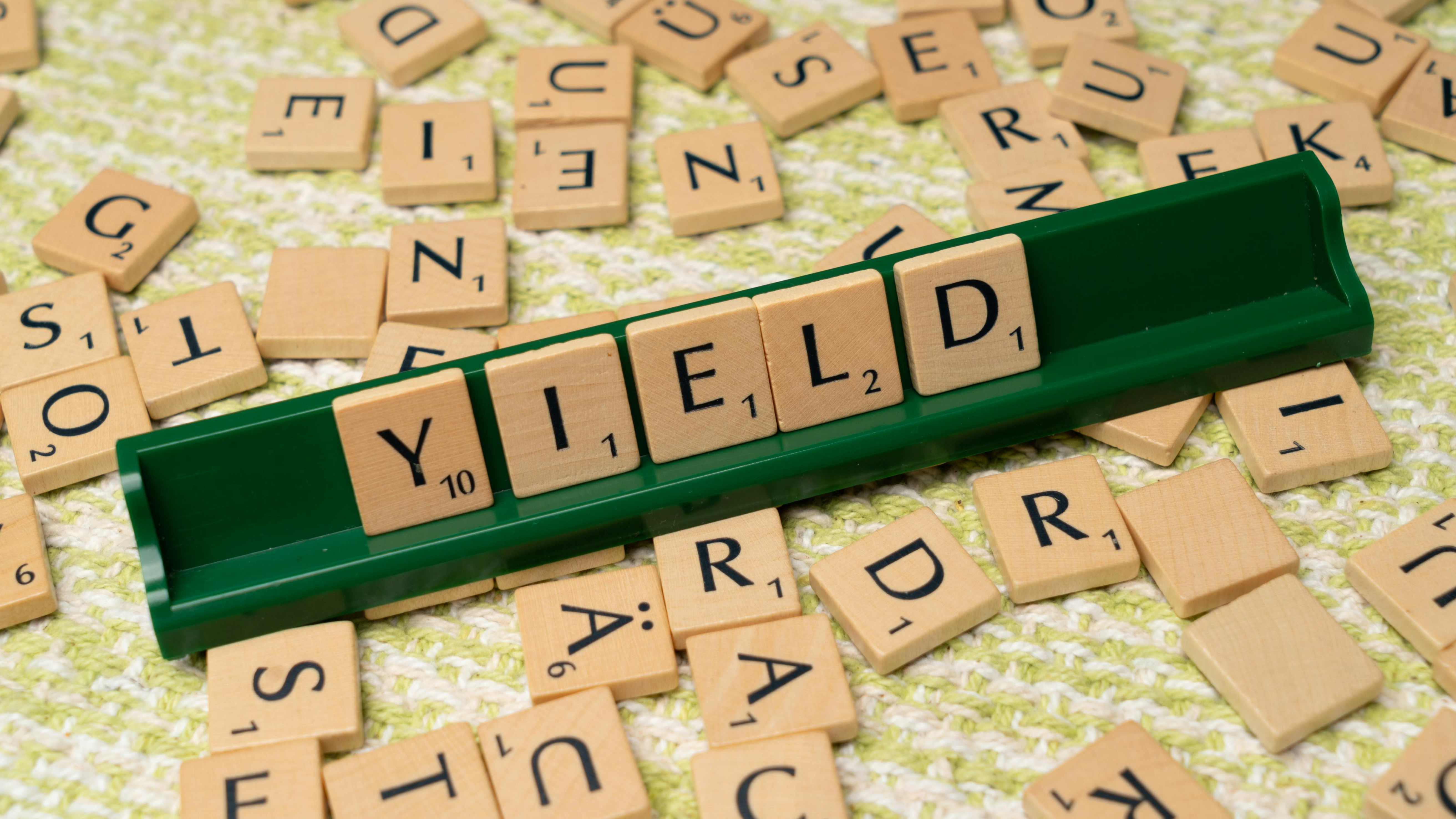 Dividend Yield scrabble letters