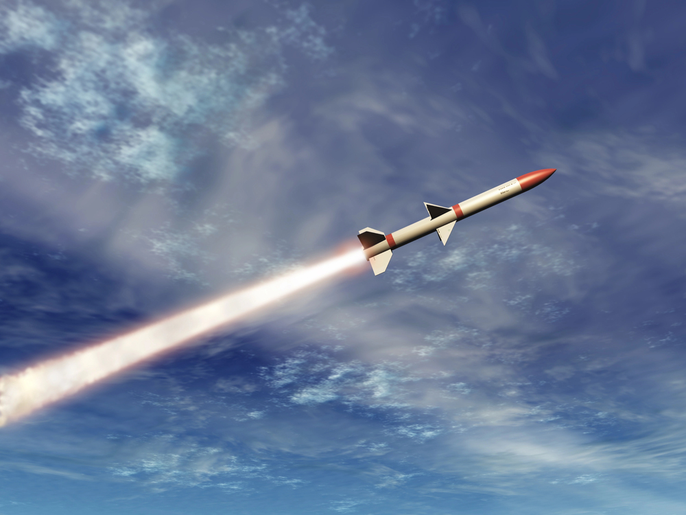 Missle flying in a cloudy sky