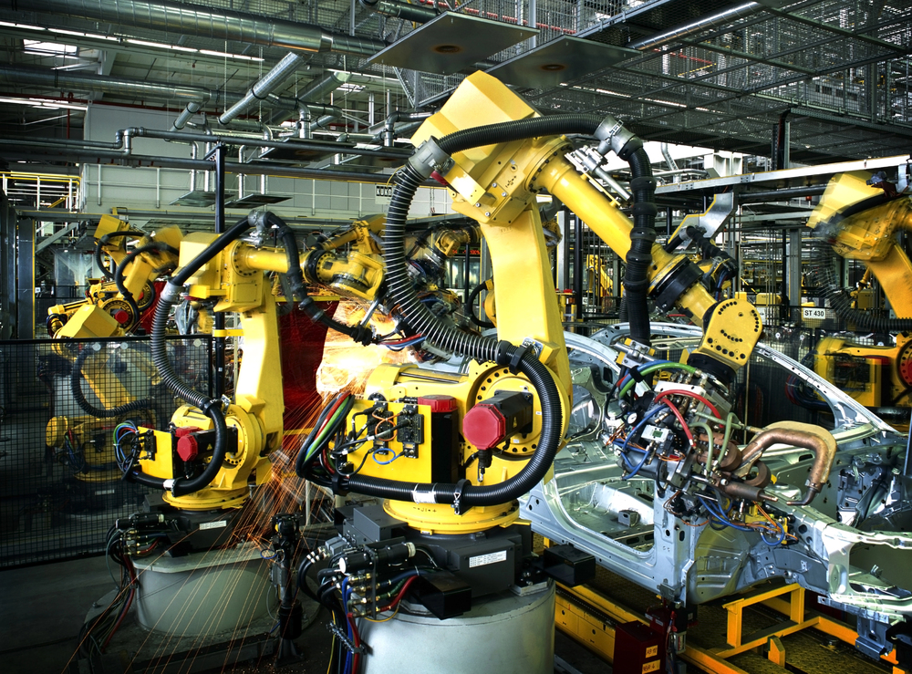 Welding robots in a car manufactory — Stock Editorial Photography