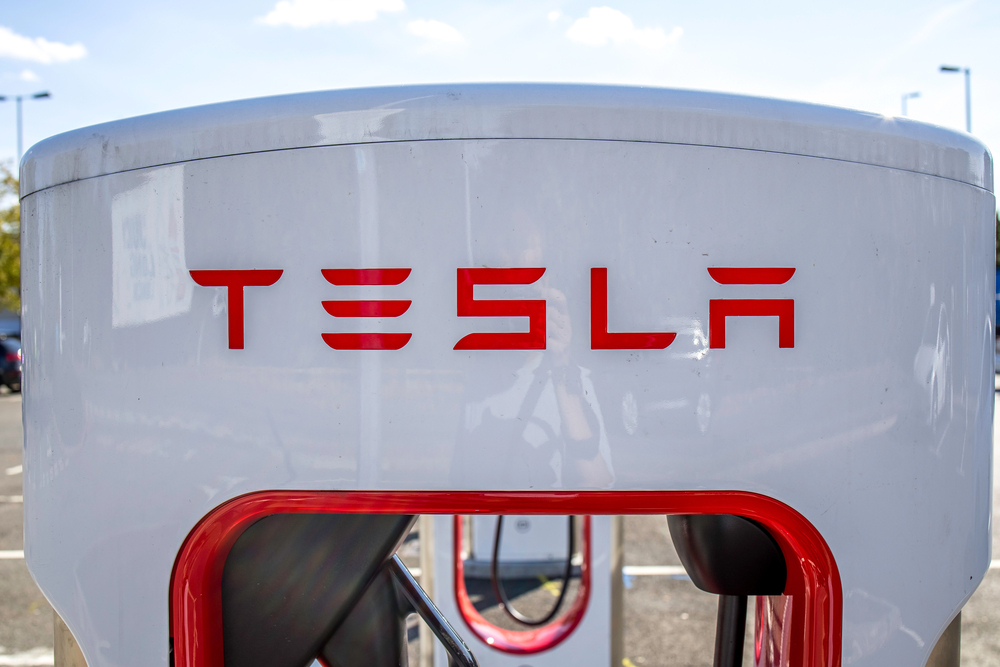 London, UK - September 14, 2023: A Tesla logo on Superchargers station.