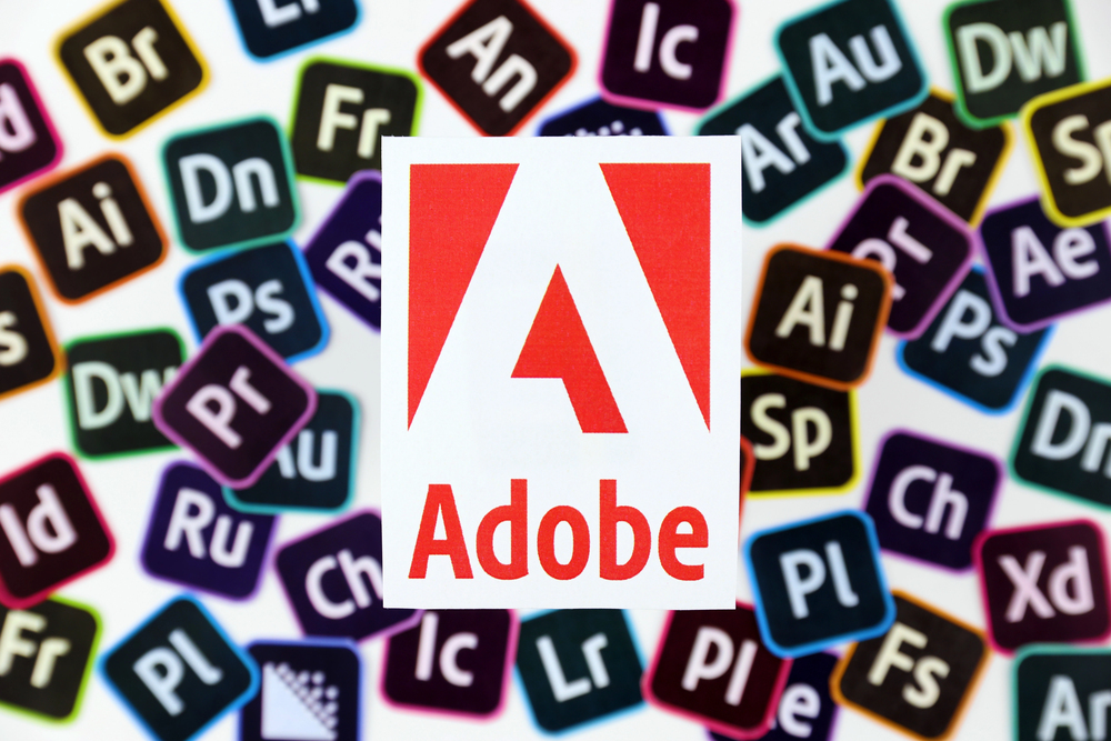 Paper logos of most popular adobe products on white background. Photoshop illustrator bridge indesign premierepro aftereffects lightroom flashbuilder and others