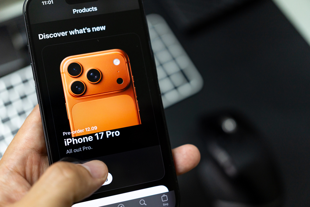 Hand Holding Smartphone Showing iPhone 17 Pro Pre-Order Screen