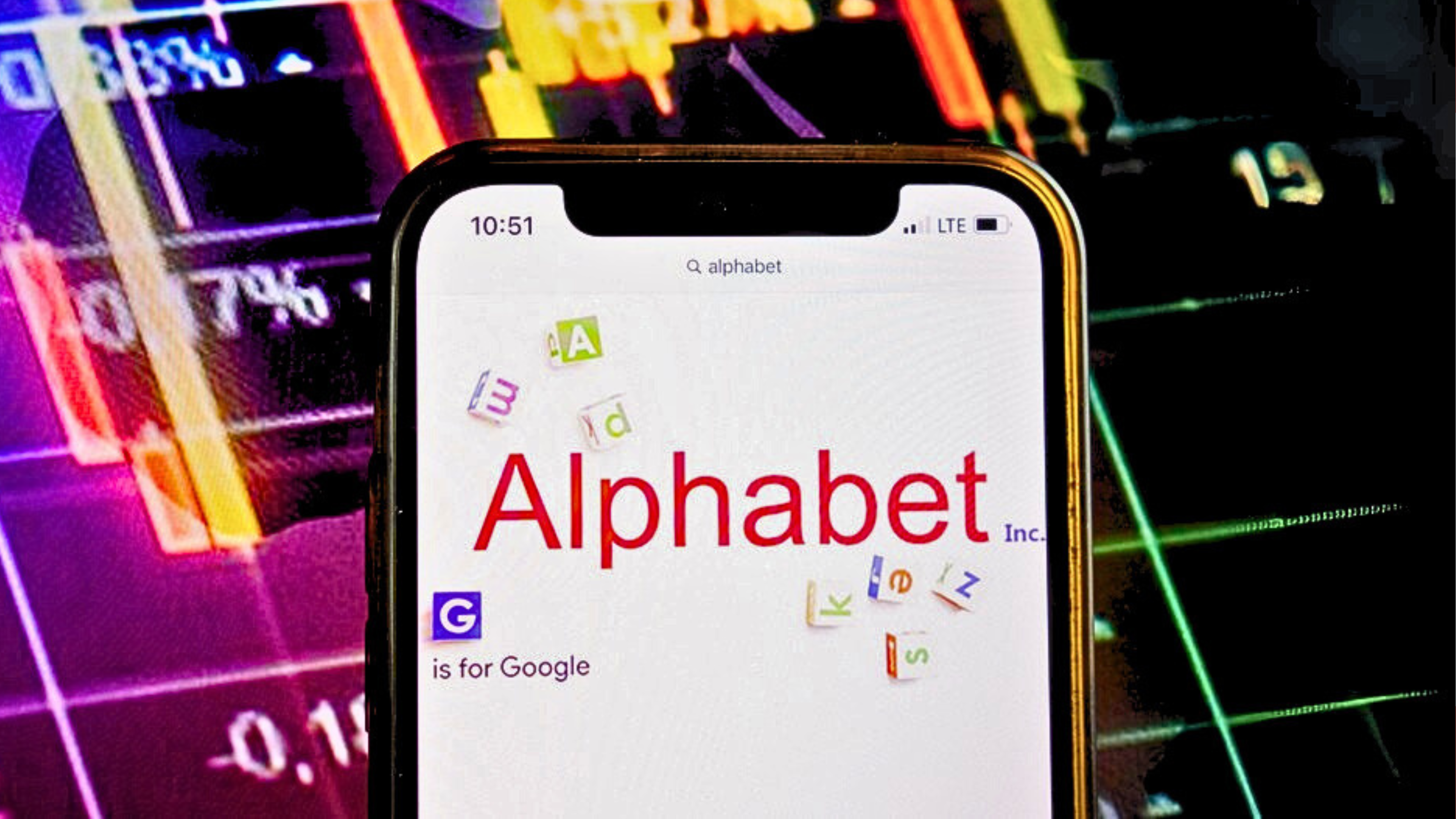 KONSKIE, POLAND - August 07, 2022: Smartphone displaying logo of Alphabet Inc American multinational technology conglomerate holding company on stock exchange diagram background