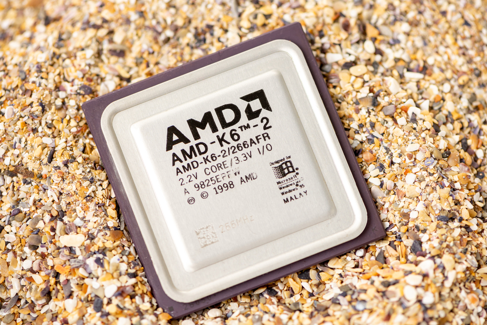 Timisoara, Romania - October 17, 2020: Close-up of an AMD-K6-2/266AFR processor, 266 MHz, socket 7 with sand in the background.