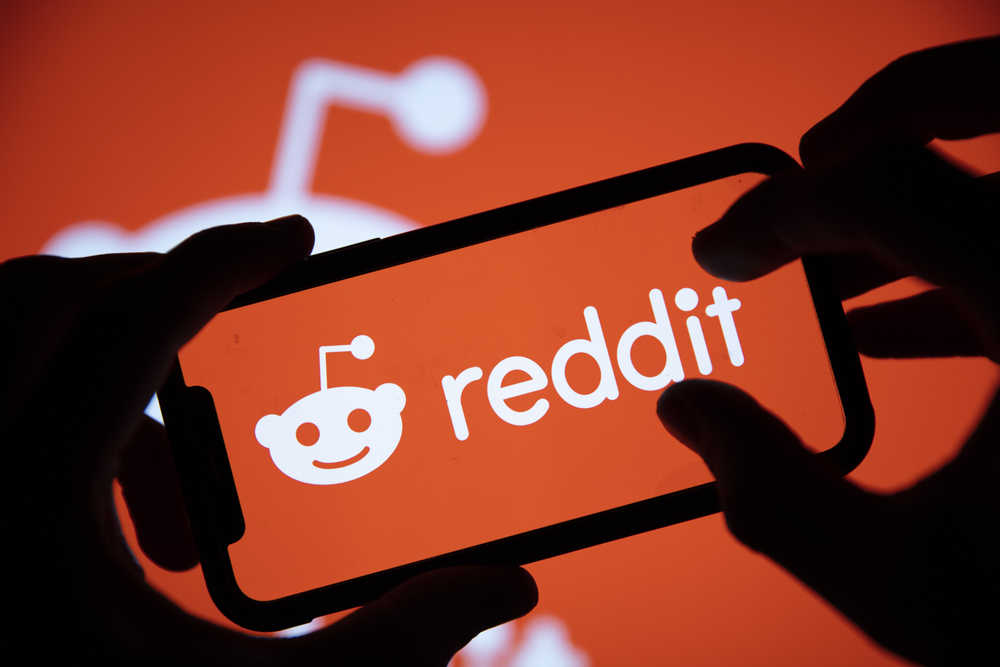 LONDON, UK - February 2021: Reddit logo displayed on a smartphone device.