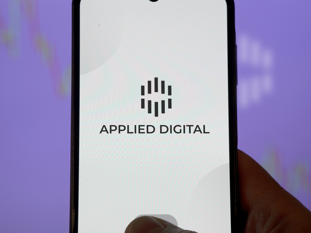 An engineer looking at Applied Digital tool on a phone — Stock Editorial Photography