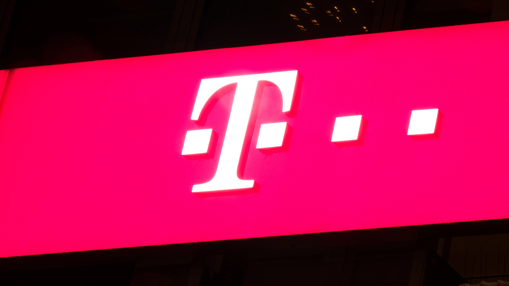 Illuminated pink Logotype of T-Mobile