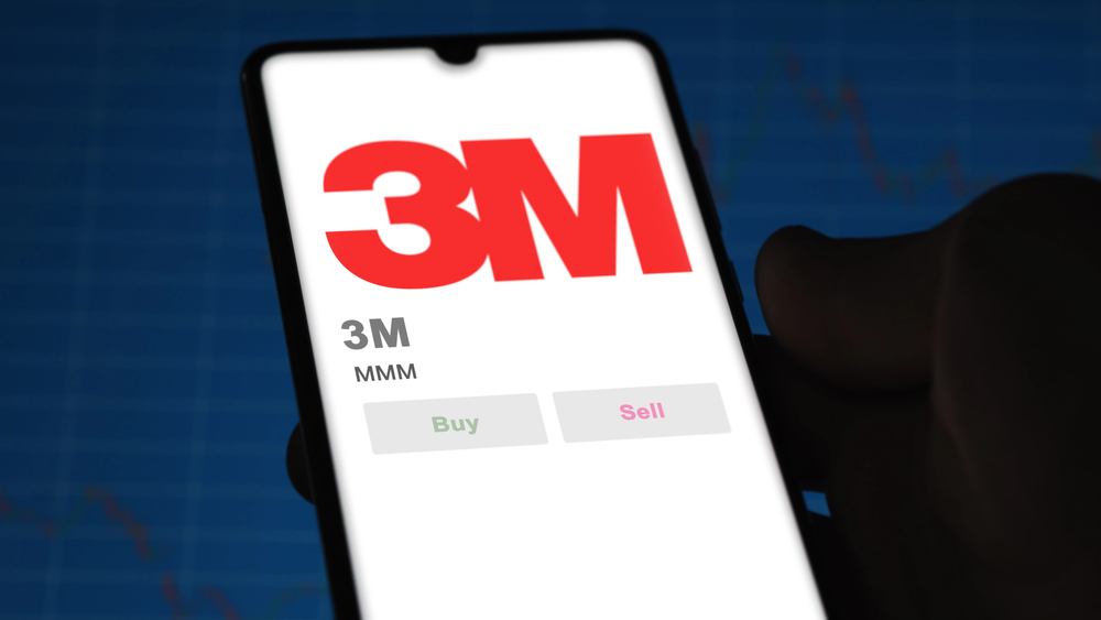 3M Logo on Cellphone with stock chart 
