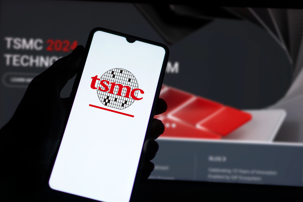 TSMC Logo in front of technology background
