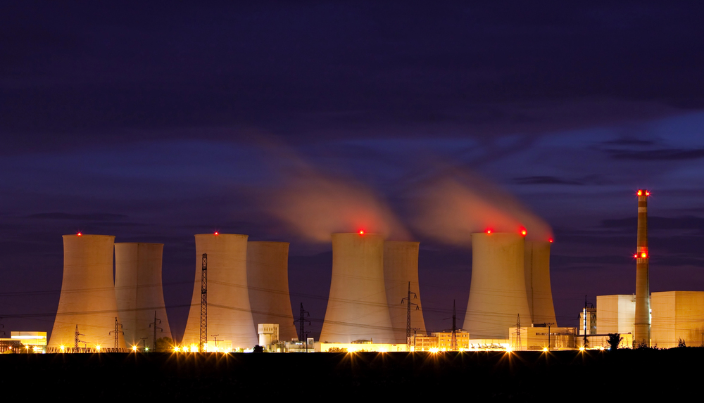 Nuclear power plant by night.