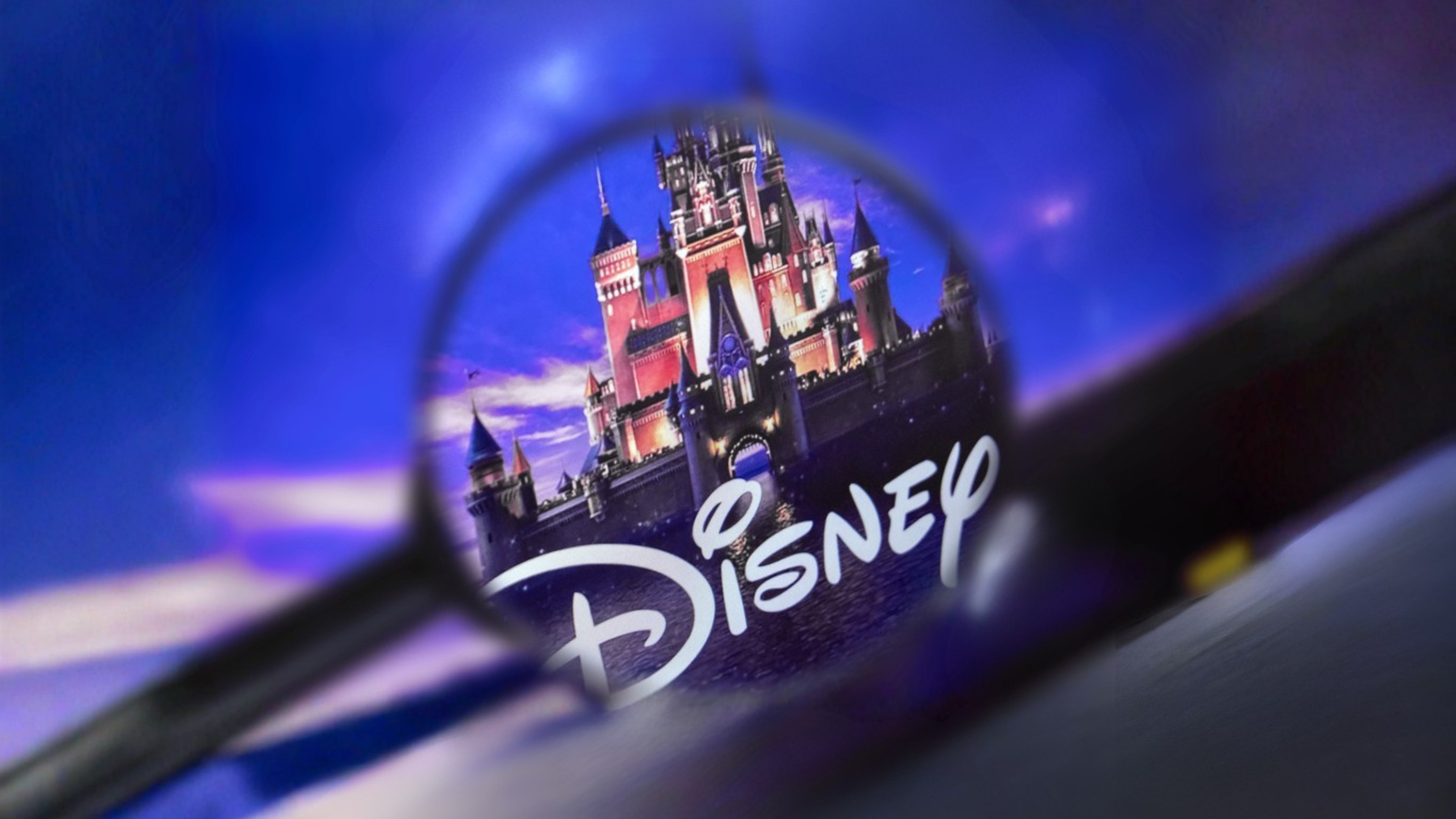 The home page of the Disney site, view through a magnifying glass.