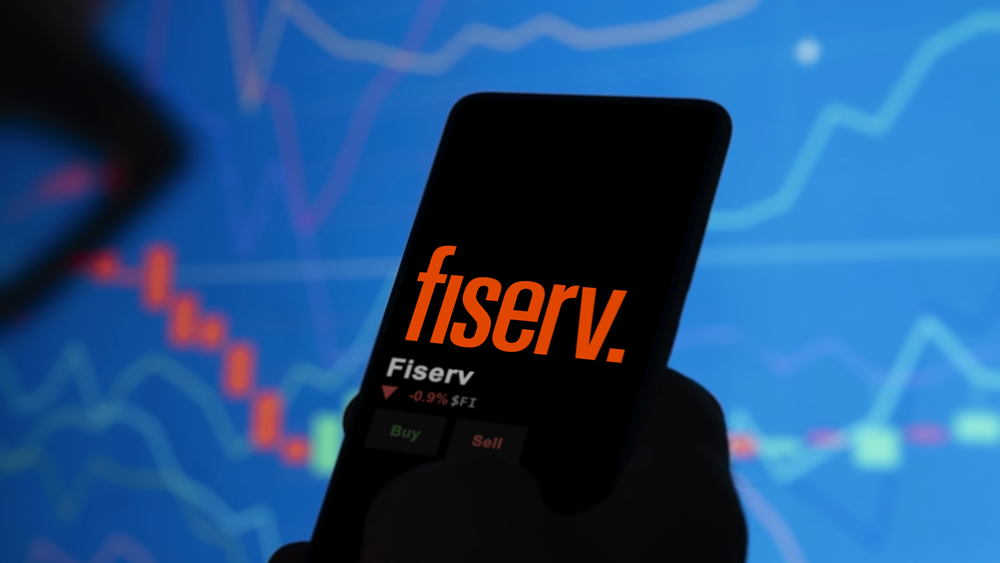 Mobile phone with Fiserv stock performance displaying. 