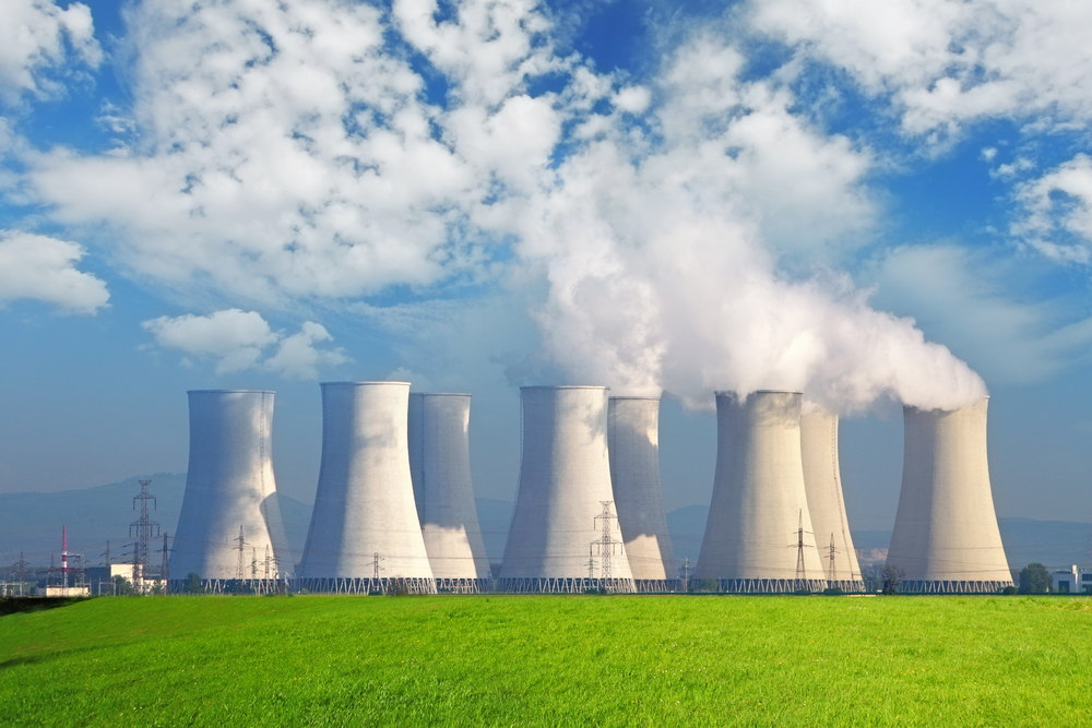 Nuclear power plant against blue sky.