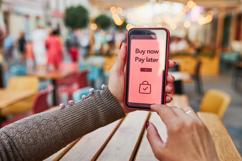 Buy now pay later online shopping service on smartphone.