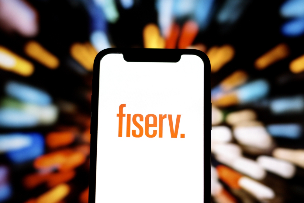 Fiserv company logo displayed on smartphone.