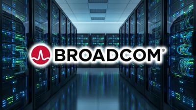 Broadcom logo dramatically highlighted in front of a data center background.
