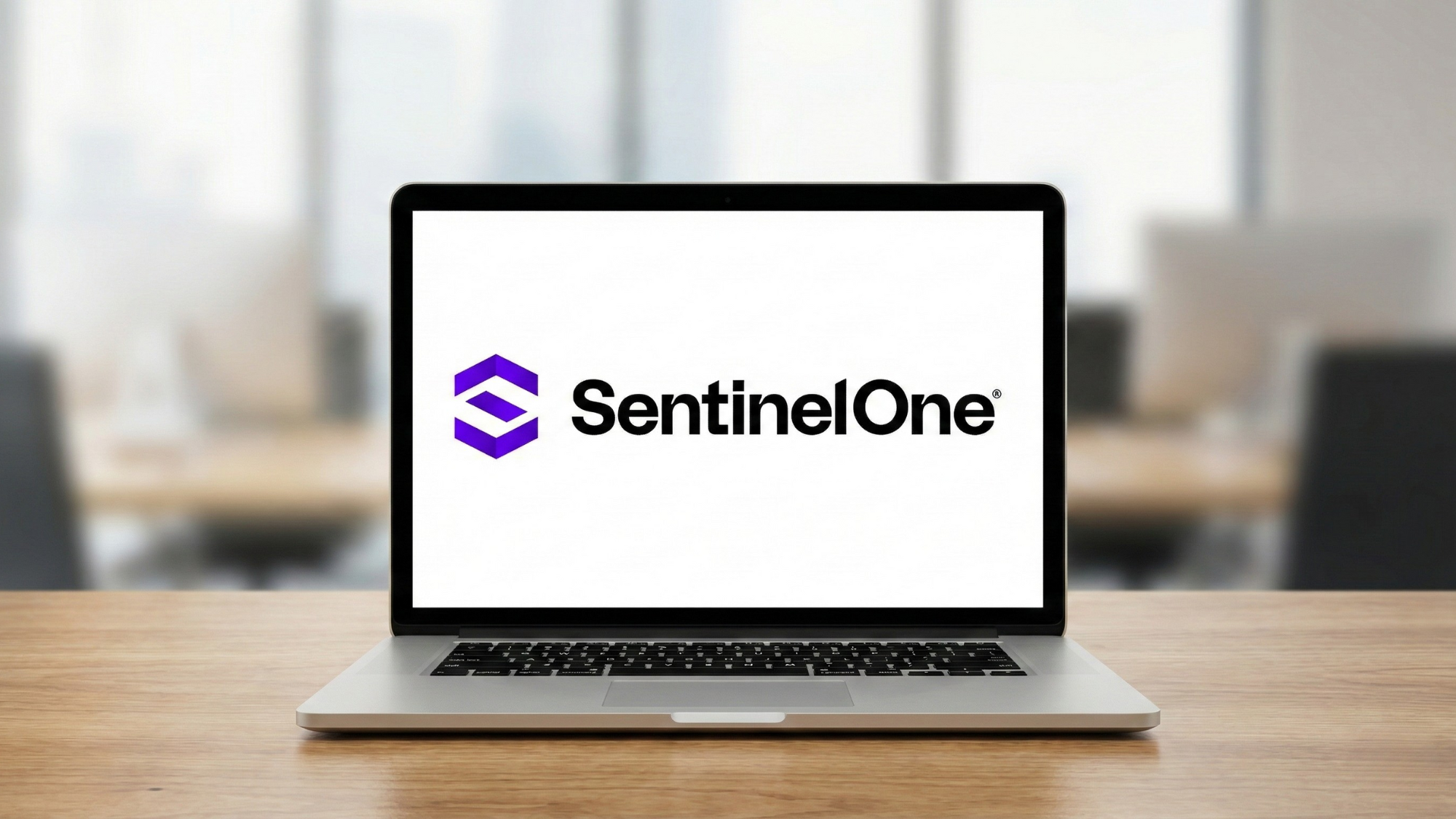 SentinelOne logo displayed on an open laptop screen, symbolizing the company's high-performing cybersecurity business.